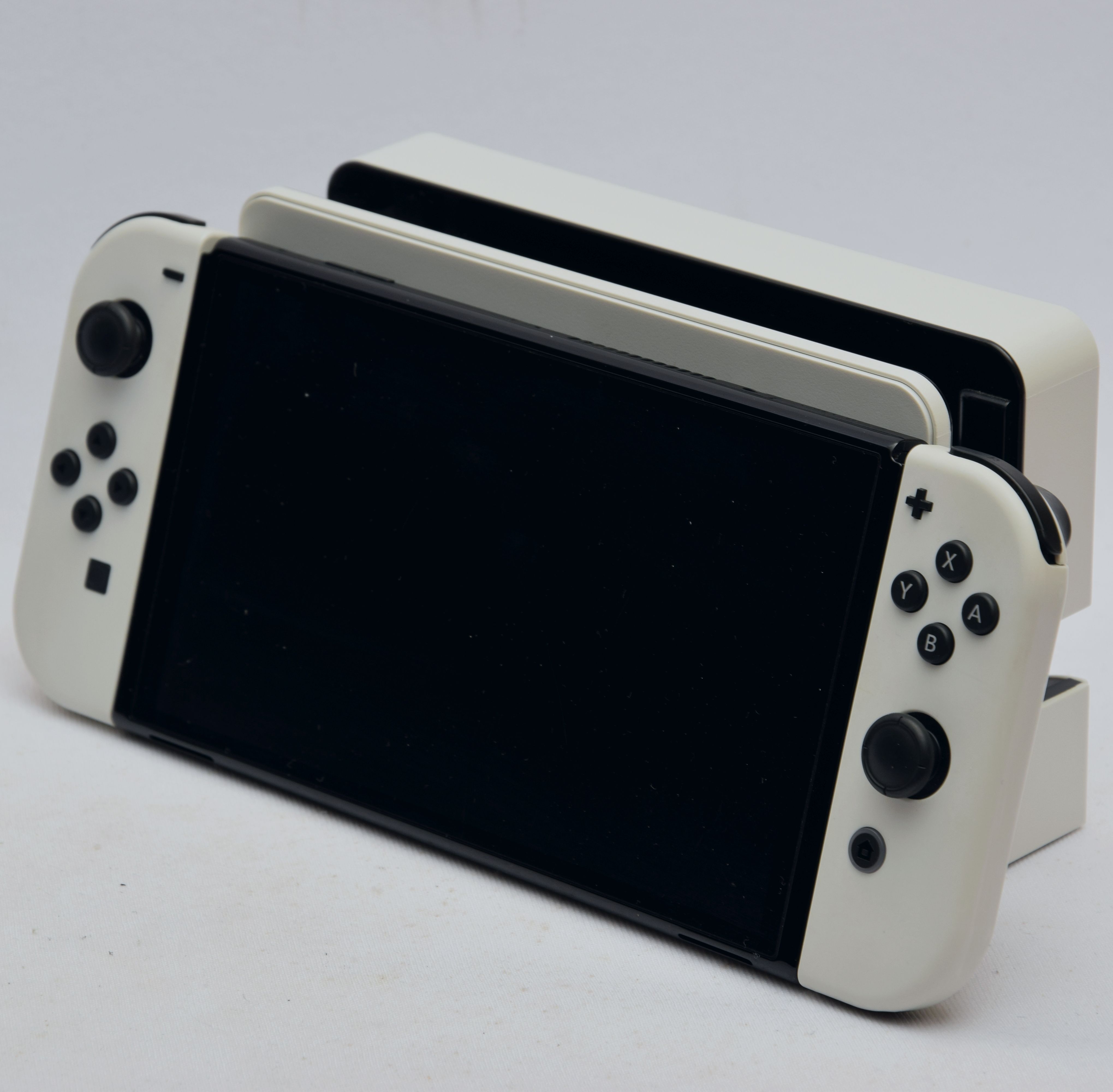 Pre-owned Nintendo 64GB OLED Switch Handheld Console, Dock